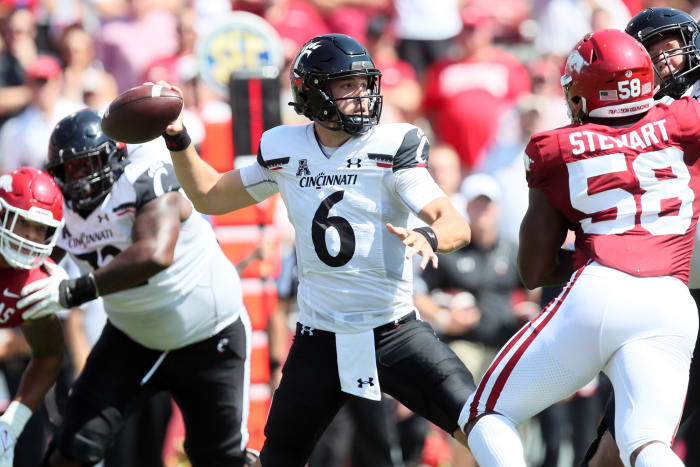 Sep 3, 2022; Fayetteville, Arkansas, USA; Cincinnati Bearcats quarterback Ben Bryant (6) passes in the first quarter against the Arkansas Razorbacks at Donald W. Reynolds Razorback Stadium. Mandatory Credit: Nelson Chenault-USA TODAY Sports